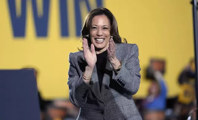 Democratic presidential nominee Vice President Kamala Harris arrives to speak at a campaign event in Burns Park Monday, Oct. 28, 2024, in Ann Arbor, Mich. (AP Photo/Paul Sancya)