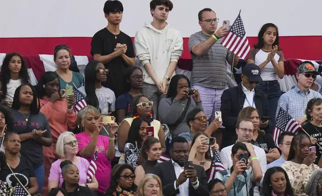 Supporters of Vice President Kamala Harris react as she delivers a concession speech for the 2024 presidential election, Wednesday, Nov. 6, 2024, on the campus of Howard University in Washington. (AP Photo/Stephanie Scarbrough)