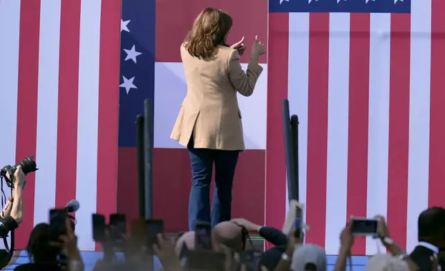 Democratic presidential nominee Vice President Kamala Harris departs after speaking during a campaign rally outside the Atlanta Civic Center, Saturday, Nov. 2, 2024. (AP Photo/Brynn Anderson)