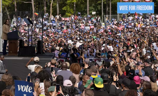 Democratic presidential nominee Vice President Kamala Harris speaks during a campaign rally outside the Atlanta Civic Center, Saturday, Nov. 2, 2024. (AP Photo/Jacquelyn Martin)