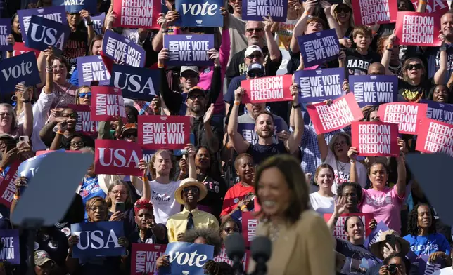 Democratic presidential nominee Vice President Kamala Harris speaks during a campaign rally outside the Atlanta Civic Center, Saturday, Nov. 2, 2024. (AP Photo/Brynn Anderson)