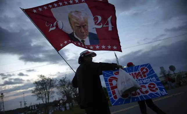 Supporters arrive before Republican presidential nominee former President Donald Trump speaks at a campaign rally in Gastonia, N.C., Saturday, Nov. 2, 2024. (AP Photo/Chris Carlson)