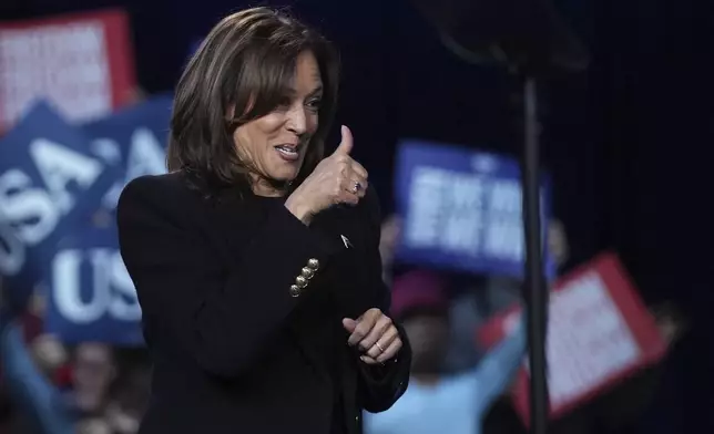 Democratic presidential nominee Vice President Kamala Harris departs after speaking during a campaign rally in Memorial Hall at Muhlenberg College in Allentown, Pa., Monday, Nov. 4, 2024. (AP Photo/Susan Walsh)