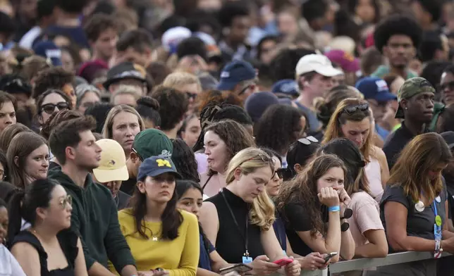 Supporters of Vice President Kamala Harris wait for her to deliver a concession speech for the 2024 presidential election, Wednesday, Nov. 6, 2024, on the campus of Howard University in Washington. (AP Photo/Stephanie Scarbrough)