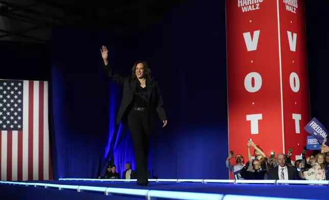 Democratic presidential nominee Vice President Kamala Harris arrives to speak during a campaign rally at the Wisconsin State Fair Expo in West Allis, Wis., Friday, Nov. 1, 2024. (AP Photo/Jacquelyn Martin)