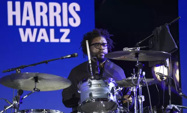 Questlove, of The Roots, performs during a campaign rally for Democratic presidential nominee Vice President Kamala Harris outside the Philadelphia Museum of Art, Monday, Nov. 4, 2024, in Philadelphia. (AP Photo/Matt Rourke)