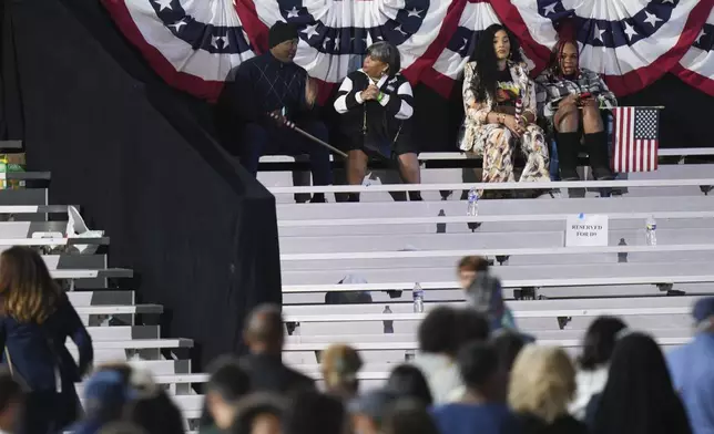 Supporters sit in the bleachers as people leave an election night campaign watch party for Democratic presidential nominee Vice President Kamala Harris after it was announced that she would not speak on Wednesday, Nov. 6, 2024, on the campus of Howard University in Washington. (AP Photo/Stephanie Scarbrough)