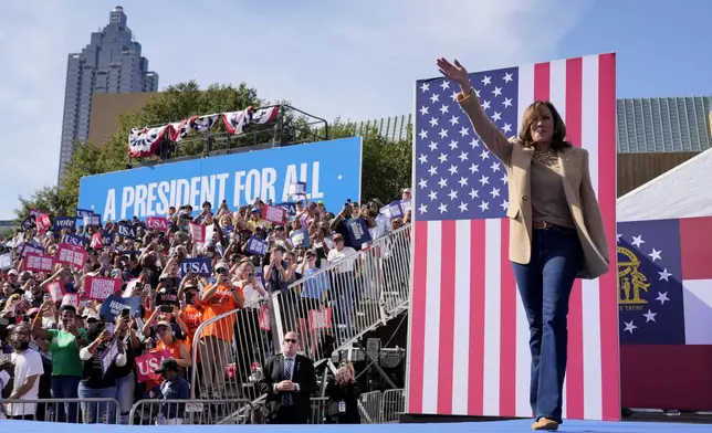 Democratic presidential nominee Vice President Kamala Harris arrives to speak at a campaign rally outside the Atlanta Civic Center, Saturday, Nov. 2, 2024. (AP Photo/Jacquelyn Martin)