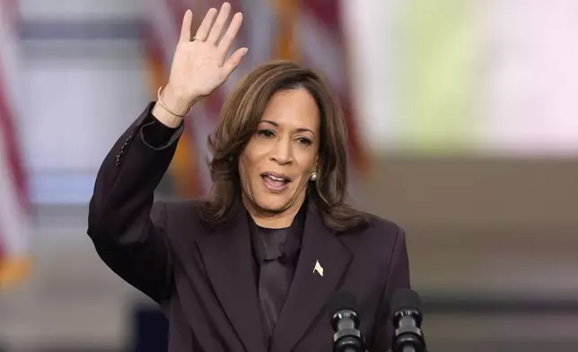 Vice President Kamala Harris departs after delivering a concession speech for the 2024 presidential election on the campus of Howard University in Washington, Wednesday, Nov. 6, 2024. (AP Photo/J. Scott Applewhite)