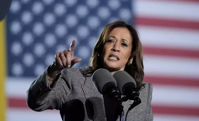 Democratic presidential nominee Vice President Kamala Harris speaks at a campaign event in Burns Park Monday, Oct. 28, 2024, in Ann Arbor, Mich. (AP Photo/Paul Sancya)