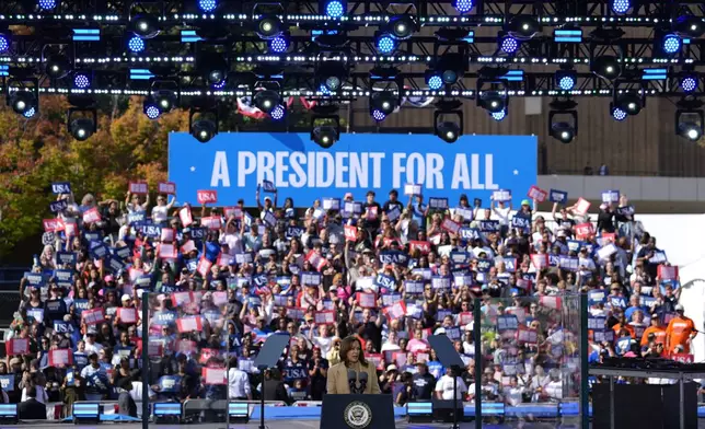 Democratic presidential nominee Vice President Kamala Harris speaks during a campaign rally outside the Atlanta Civic Center, Saturday, Nov. 2, 2024. (AP Photo/Brynn Anderson)