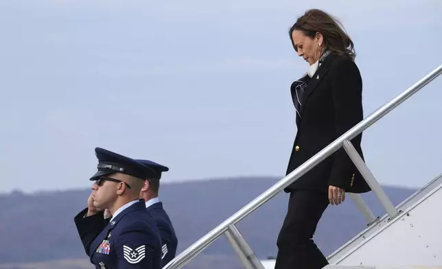 Democratic presidential nominee Vice President Kamala Harris arrives on Air Force Two at Wilkes-Barre Scranton International Airport in Scranton, Pa., Monday Nov. 4, 2024. (AP Photo/Jacquelyn Martin, Pool)