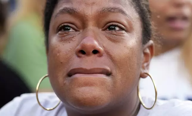 A supporter cries as Vice President Kamala Harris delivers a concession speech after the 2024 presidential election, Wednesday, Nov. 6, 2024, on the campus of Howard University in Washington. (AP Photo/Jacquelyn Martin)