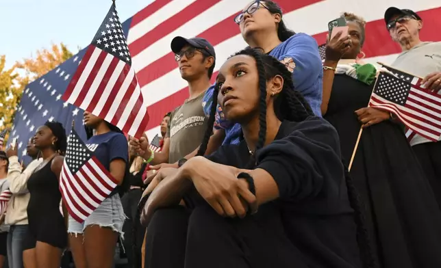 Supporters of Vice President Kamala Harris react during her concession speech for the 2024 presidential election on the campus of Howard University, Wednesday, Nov. 6, 2024, in Washington. (AP Photo/Terrance Williams)