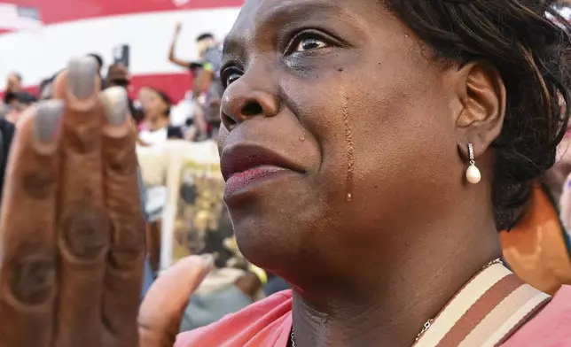 A supporter of Vice President Kamala Harris reacts at her concession speech for the 2024 presidential election on the campus of Howard University in Washington, Wednesday, Nov. 6, 2024. (AP Photo/Terrance Williams)