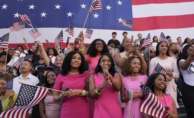 Supporters look on as Vice President Kamala Harris delivers a concession speech for the 2024 presidential election, Wednesday, Nov. 6, 2024, on the campus of Howard University in Washington. (AP Photo/Susan Walsh)