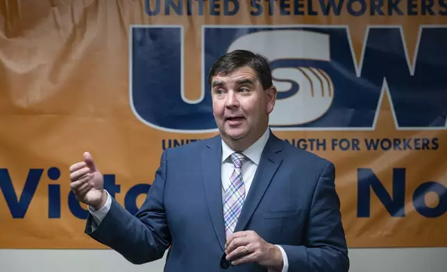 New York State Senator John Mannion, Democratic candidate for New York's 22nd congressional district, meets with representatives and members of the United Steelworkers in Geddes, N.Y. Thursday. Oct. 24. 2024. (AP Photo/Craig Ruttle)