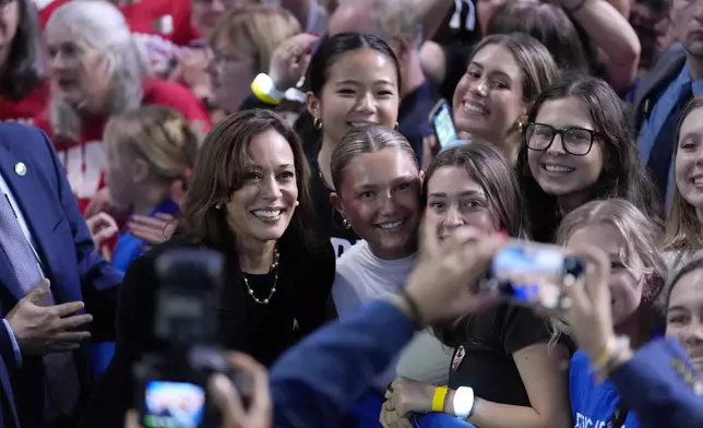 FILE - Democratic presidential nominee Vice President Kamala Harris takes a photo with supporters during a campaign rally at the Alliant Energy Center in Madison, Wis., Wednesday, Oct. 30, 2024. (AP Photo/Jacquelyn Martin, File)