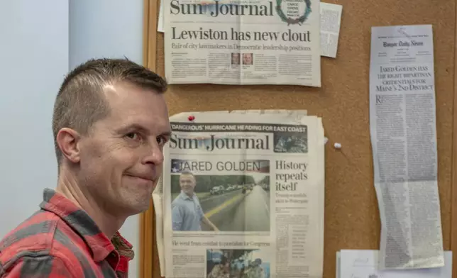 Rep. Jared Golden, D-Maine, walks down a hallway before addressing the media Wednesday afternoon, Nov. 6, 2024, during a press conference at his campaign office in Lewiston, Maine. (Russ Dillingham/Sun Journal via AP)