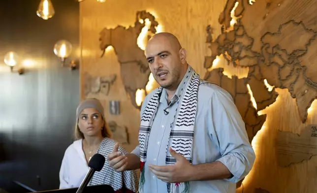 Uncommitted National Movement organizers Abbas Alawieh, right, and Lexis Zeidan, speak to the media about President-elect Donald Trump's victory Wednesday, Nov. 6, 2024, in Dearborn, Mich. (AP Photo/David Goldman)