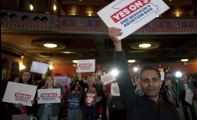 People at an election night watch party react after an abortion rights amendment to the Missouri constitution passed, Tuesday, Nov. 5, 2024, in Kansas City, Mo. (AP Photo/Charlie Riedel)