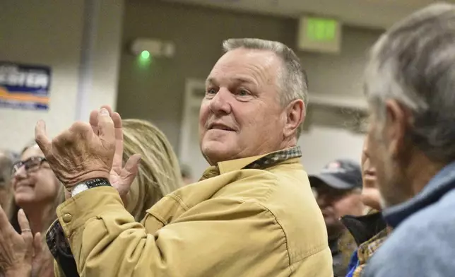 U.S. Sen. Jon Tester, a Democrat from Montana seeking re-election to a fourth term, is seen at a campaign rally in a hotel ballroom, Oct. 25, 2024, in Bozeman, Mont. (AP Photo/Matthew Brown)