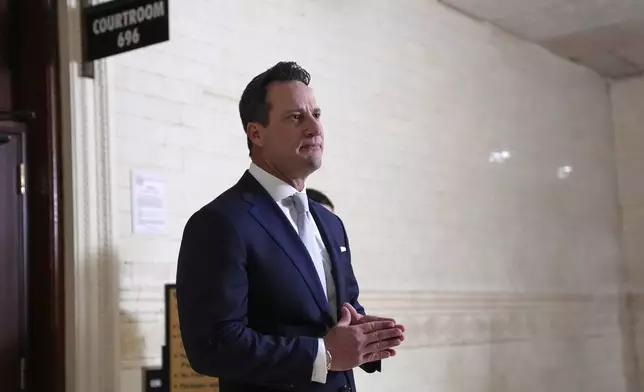 America PAC lawyer Chris Gober speaks with members of the media ahead of a hearing at a City Hall courtroom in Philadelphia, Monday, Nov. 4, 2024. (AP Photo/Matt Rourke)