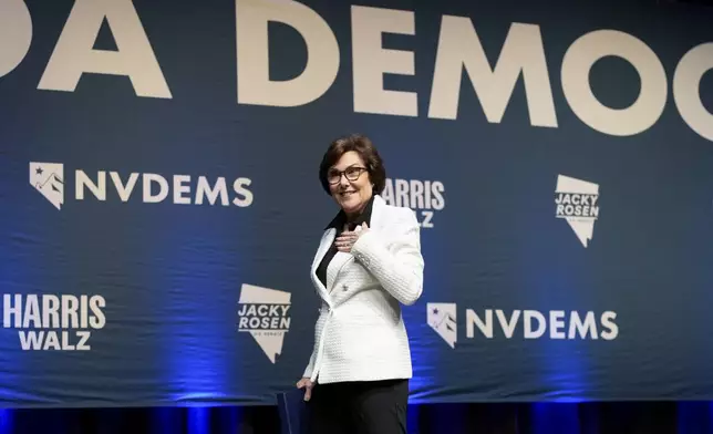 Sen. Jacky Rosen, D-Nev., reacts to the crowd after speaking to supporters during an election watch party Wednesday, Nov. 6, 2024, in Las Vegas. (AP Photo/John Locher)