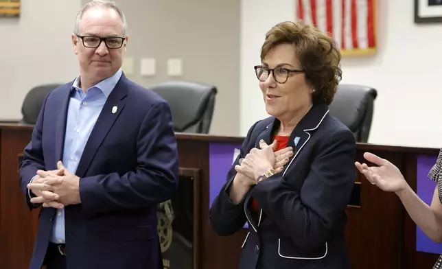 Sen. Jacky Rosen, right, D-Nev., arrives to give a victory speech at the Teamsters Local 631 meeting hall Saturday, Nov. 9, 2024, in Las Vegas. Tommy Blitsch, Secretary-Treasurer of the Teamsters Local 631, stands at left. (Steve Marcus/Las Vegas Sun via AP)