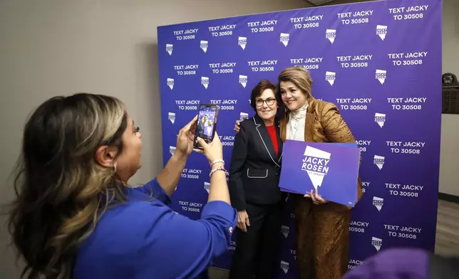 Sen. Jacky Rosen, D-Nev., poses with supporter Maritza Rodriguez after giving a victory speech at the Teamsters Local 631 meeting hall Saturday, Nov. 9, 2024, in Las Vegas. (Steve Marcus/Las Vegas Sun via AP)