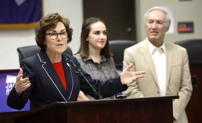 Sen. Jacky Rosen, left, D-Nev., gives a victory speech at the Teamsters Local 631 meeting hall Saturday, Nov. 9, 2024, in Las Vegas. (Steve Marcus/Las Vegas Sun via AP)