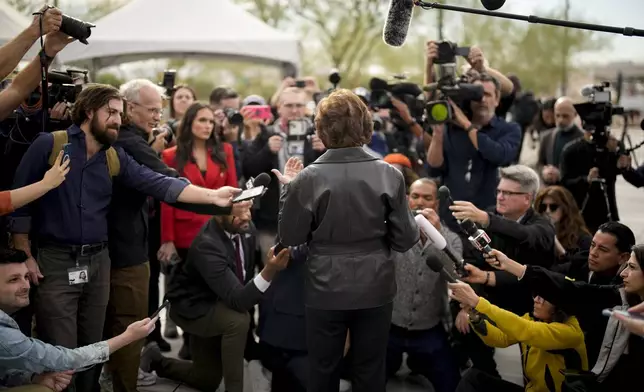 Senator Jacky Rosen, D-Nev., speaks to members of the media after voting at the Allegiant Stadium polling place, Tuesday, Nov. 5, 2024, in Las Vegas. (AP Photo/John Locher)