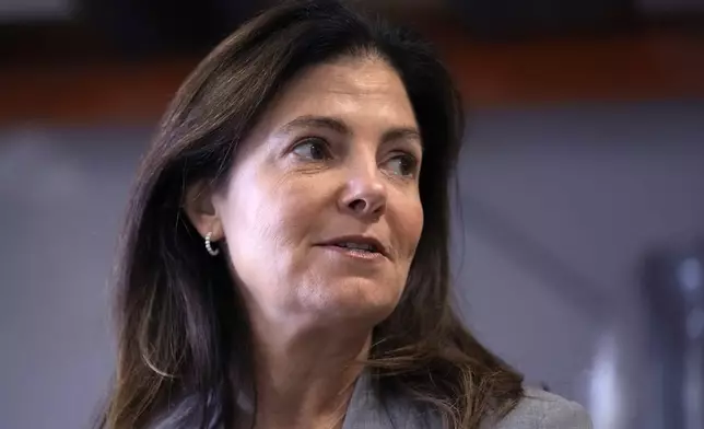 FILE — Republican gubernatorial candidate Kelly Ayotte, who faces Democrat Joyce Craig in the November 2024 election, answers a question during a visit to a local concrete coating business, Wednesday, Oct. 16, 2024, in Manchester, N.H. (AP Photo/Charles Krupa, File)