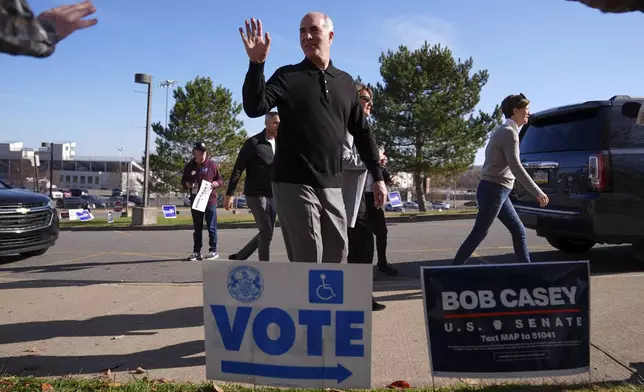 Sen. Bob Casey, D-Pa., departs a polling place after voting, Tuesday, Nov. 5, 2024, in Scranton, Pa. (AP Photo/Matt Rourke)