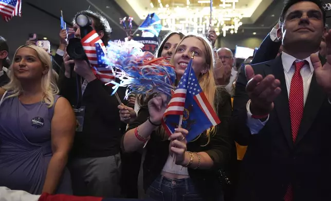 Supporters cheer as Republican Pennsylvania Senate candidate David McCormick speaks during an election night watch party, Wednesday, Nov. 6, 2024, in Pittsburgh. (AP Photo/Gene J. Puskar)