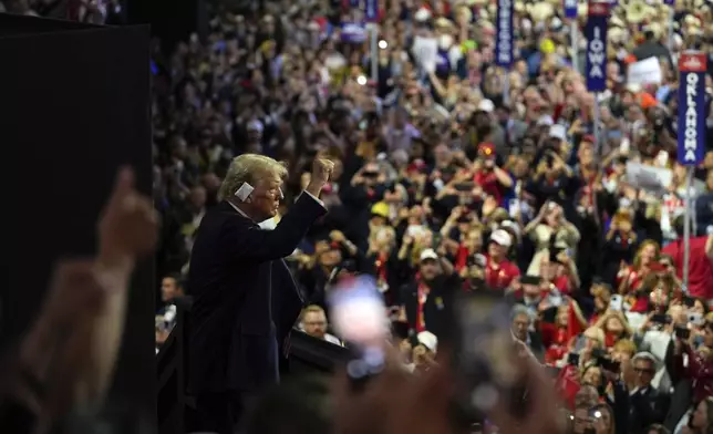 Republican presidential candidate former President Donald Trump gestures as he arrives at the Republican National Convention Wednesday, July 17, 2024, in Milwaukee. (AP Photo/Julia Nikhinson)