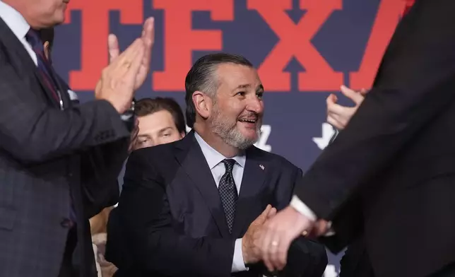 Sen. Ted Cruz, R-Texas, shakes hands during a watch party on election night, Tuesday, Nov. 5, 2024, at the Marriott Marquis in Houston. (AP Photo/LM Otero)