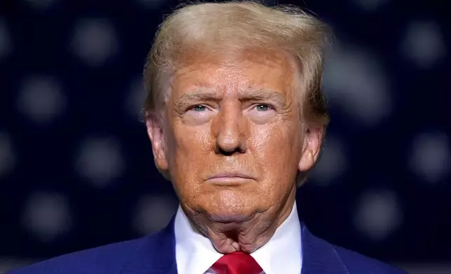 Republican presidential nominee former President Donald Trump arrives to speak at a campaign event at Alro Steel, Thursday, Aug. 29, 2024, in Potterville, Mich. (AP Photo/Alex Brandon)