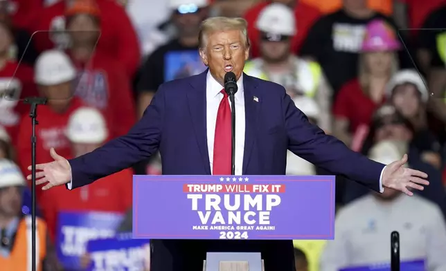 Republican presidential nominee former President Donald Trump speaks at a campaign rally at PPG Paints Arena, Monday, Nov. 4, 2024, in Pittsburgh. (AP Photo/Matt Freed)