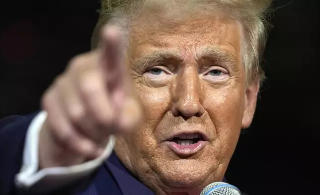 Republican presidential nominee former President Donald Trump speaks at a town hall at Lancaster County Convention Center, Sunday, Oct. 20, 2024, in Lancaster, Pa. (AP Photo/Evan Vucci)