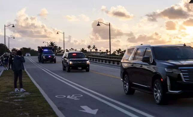 A motorcade carrying President-elect Donald Trump leaves Trump's Mar-a-Lago estate, Wednesday, Nov. 13, 2024, in Palm Beach, Fla. (AP Photo/Julia Demaree Nikhinson)