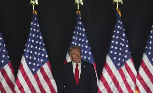 Republican presidential nominee former President Donald Trump arrives at a campaign rally at Macomb Community College Friday, Nov. 1, 2024, in Warren, Mich. (AP Photo/Paul Sancya)