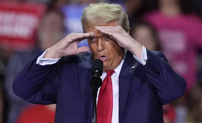 Republican presidential nominee former President Donald Trump speaks at a campaign rally at Van Andel Arena, Tuesday, Nov. 5, 2024, in Grand Rapids, Mich. (AP Photo/Carlos Osorio)