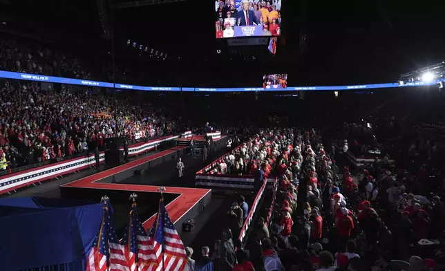 Republican presidential nominee former President Donald Trump speaks at a campaign rally at Van Andel Arena, Tuesday, Nov. 5, 2024, in Grand Rapids, Mich. (AP Photo/Paul Sancya)