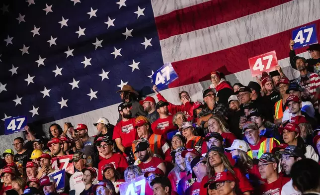 Supporters cheer on Republican presidential nominee former President Donald Trump during a campaign rally at Macomb Community College, Friday, Nov. 1, 2024, in Warren, Mich. (AP Photo/Julia Demaree Nikhinson)