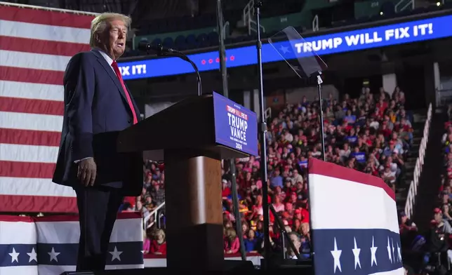 Republican presidential nominee former President Donald Trump speaks at a campaign rally at First Horizon Coliseum, Saturday, Nov. 2, 2024, in Greensboro, N.C. (AP Photo/Evan Vucci)