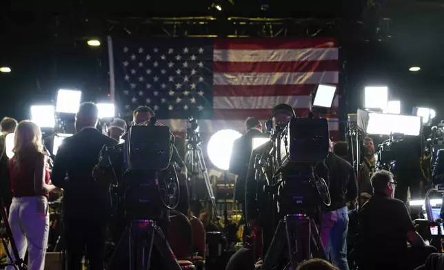 Members of media work at an election night campaign watch party for Republican presidential nominee former President Donald Trump Tuesday, Nov. 5, 2024, in West Palm Beach, Fla.(AP Photo/Alex Brandon)