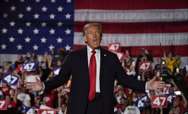 Republican presidential nominee former President Donald Trump arrives at a campaign rally at Macomb Community College, Friday, Nov. 1, 2024, in Warren, Mich. (AP Photo/Julia Demaree Nikhinson)