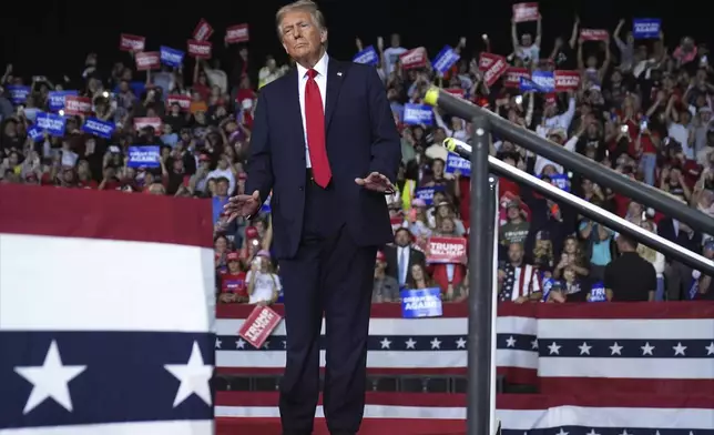 Republican presidential nominee former President Donald Trump arrives for a campaign rally at the Salem Civic Center, Saturday, Nov. 2, 2024, in Salem, Va. (AP Photo/Evan Vucci)