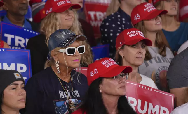 Supporters arrives before Republican presidential nominee former President Donald Trump speaks at a campaign rally at Gastonia Municipal Airport, Saturday, Nov. 2, 2024, in Gastonia, N.C. (AP Photo/Evan Vucci)